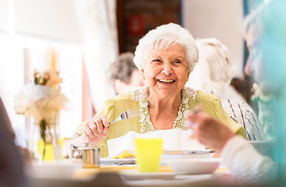 Older woman enjoying meal